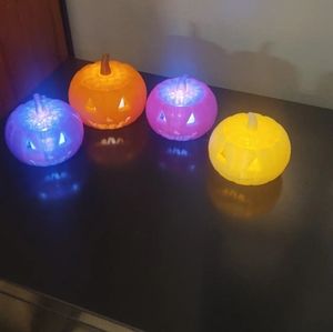 Four unique 3d printed jackolanterns with tealights adorable fall decorHalloween
